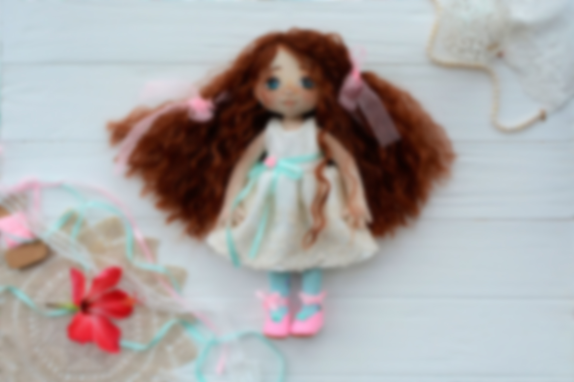 Handmade doll in bright clothes with natural hair