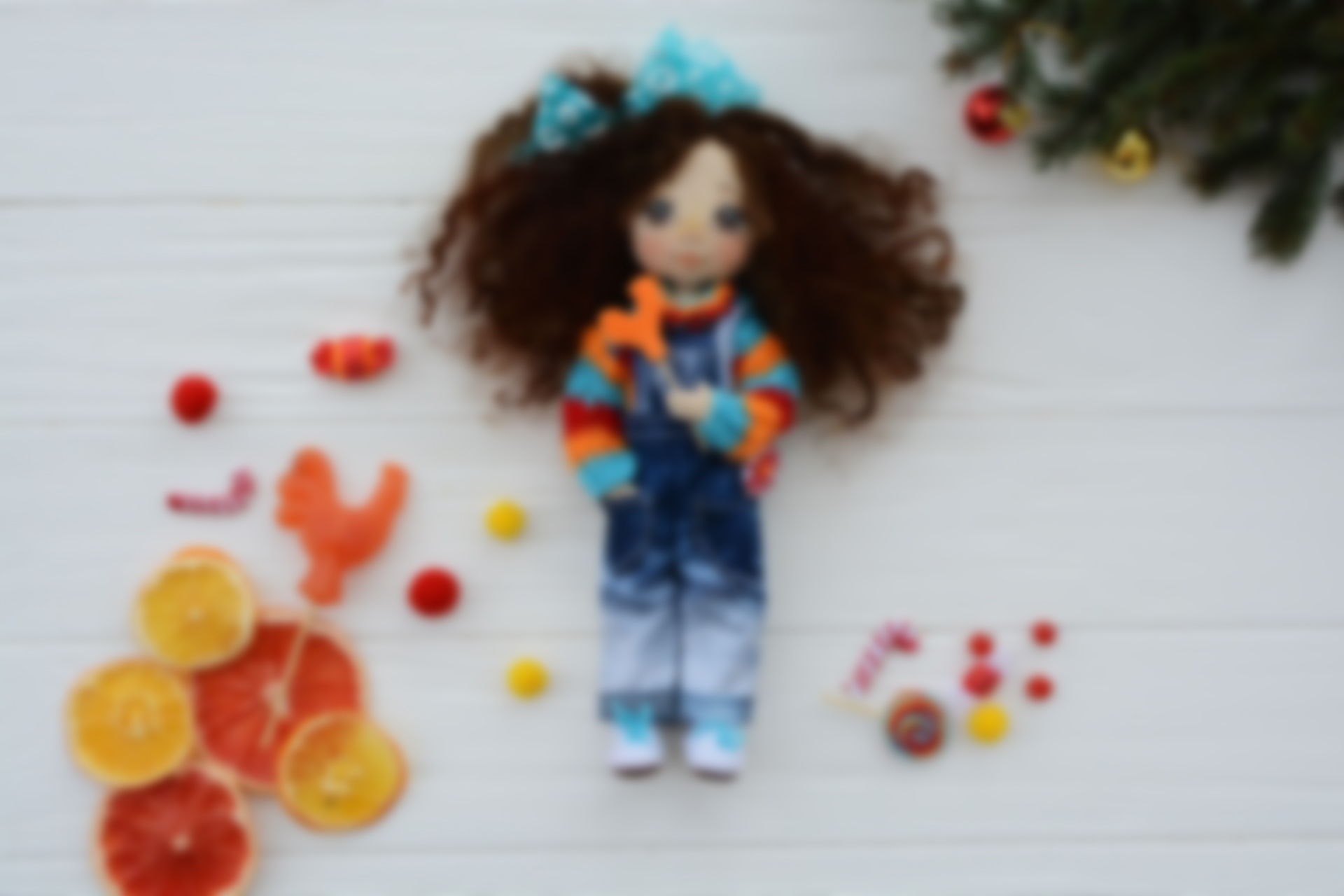 Handmade doll with tangerines, grapefruit & spruce branches